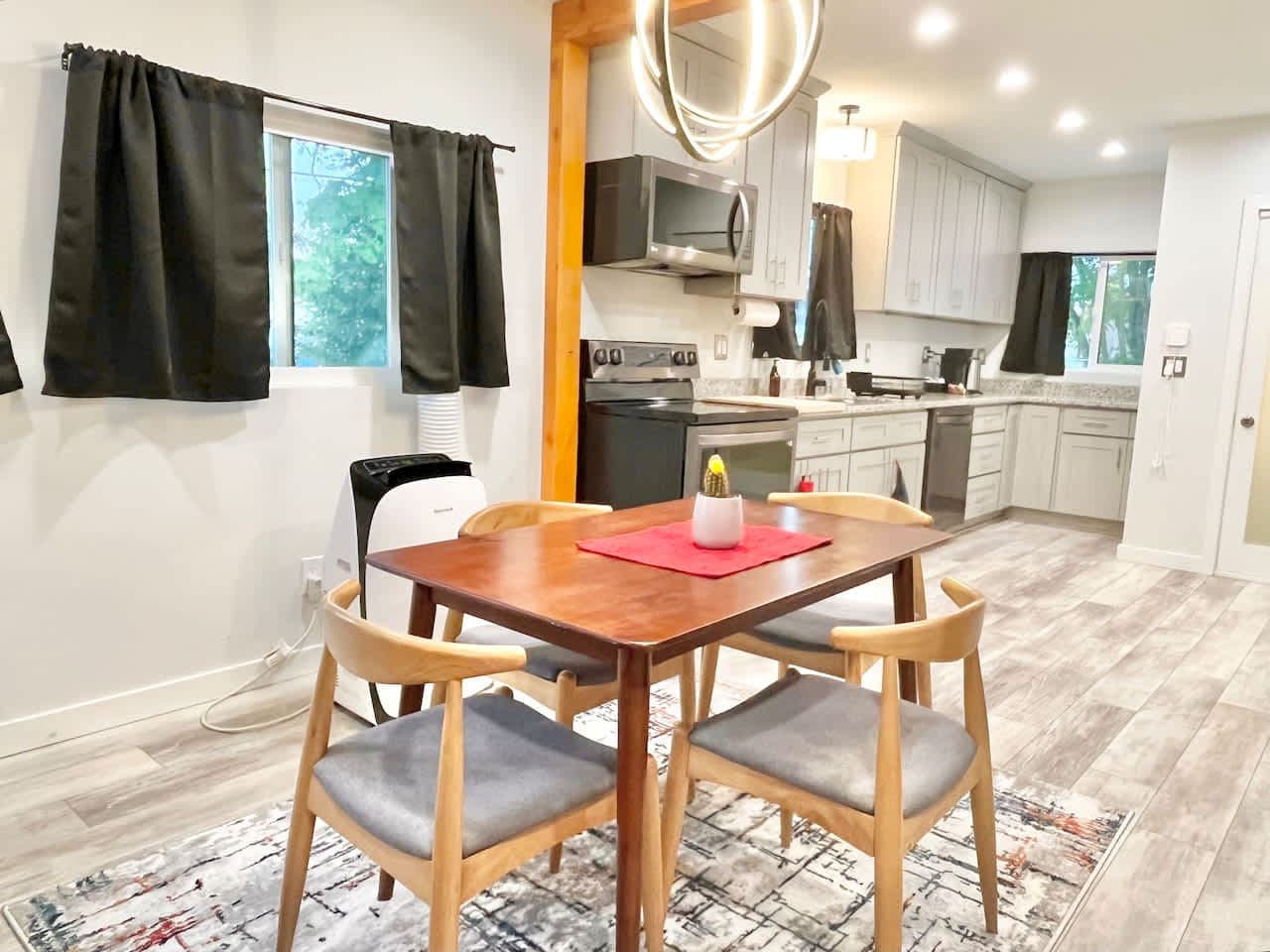 Comfortable 4-seater dining setup offering a welcoming space to enjoy home-cooked meals