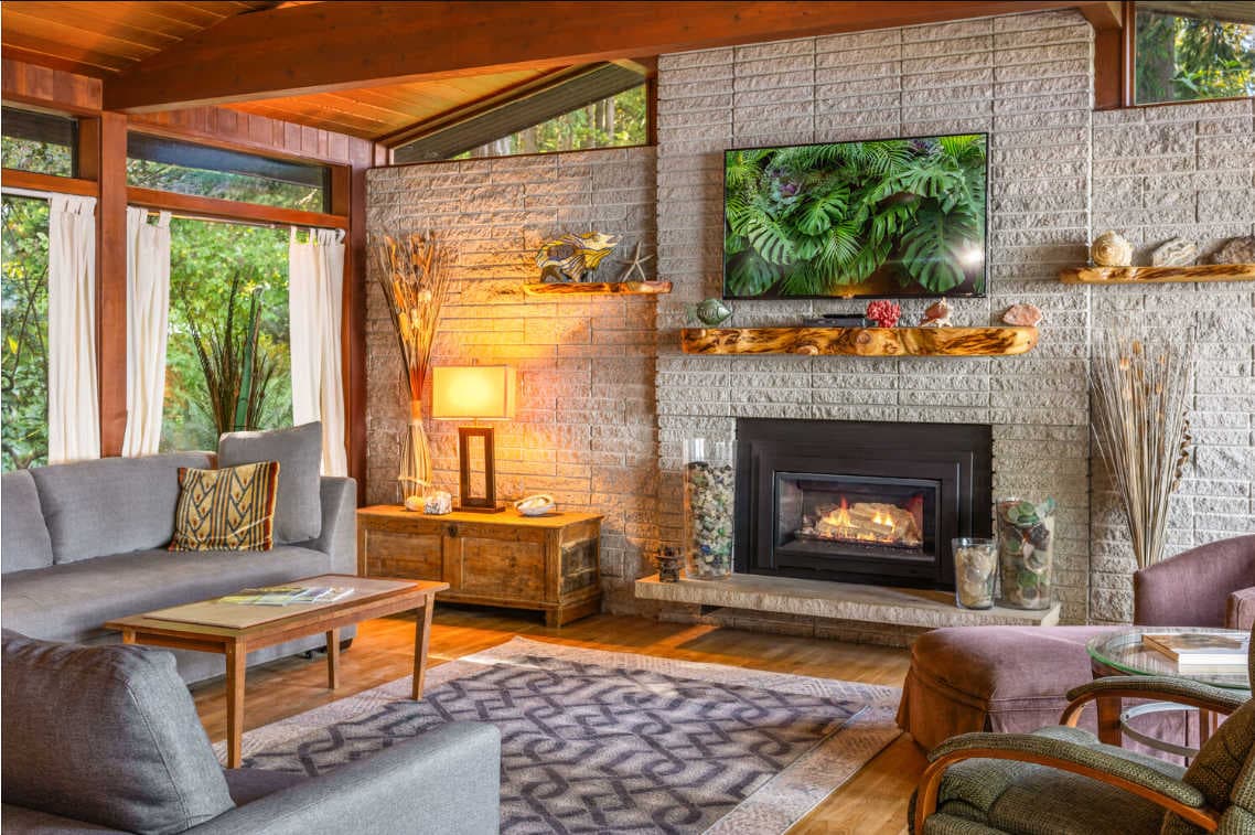 Cozy up by the fireplace with your favorite drink and let the view do the talking