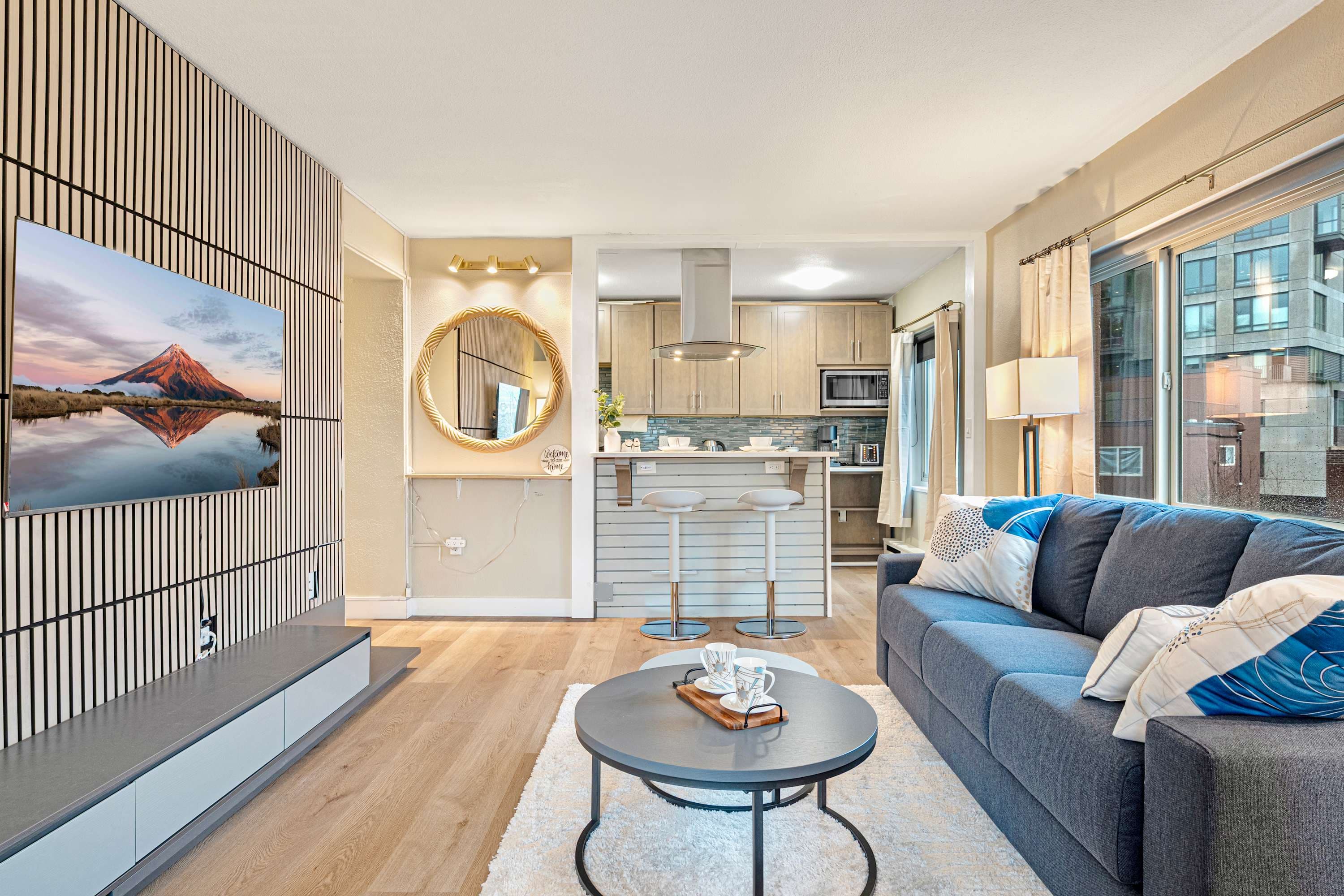 Indulge in a cozy evening in the stylish, open-concept living area.