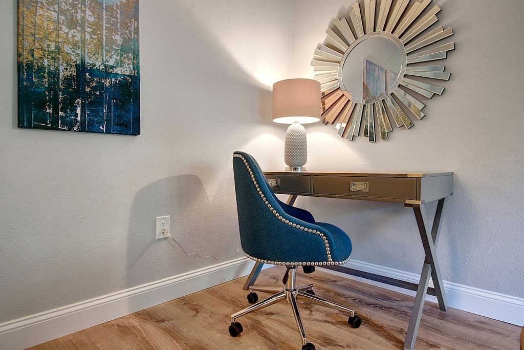 Need to work during your business trip or want to journal about your trip? We have a stylish desk and a comfy chair for you to get those tasks done.