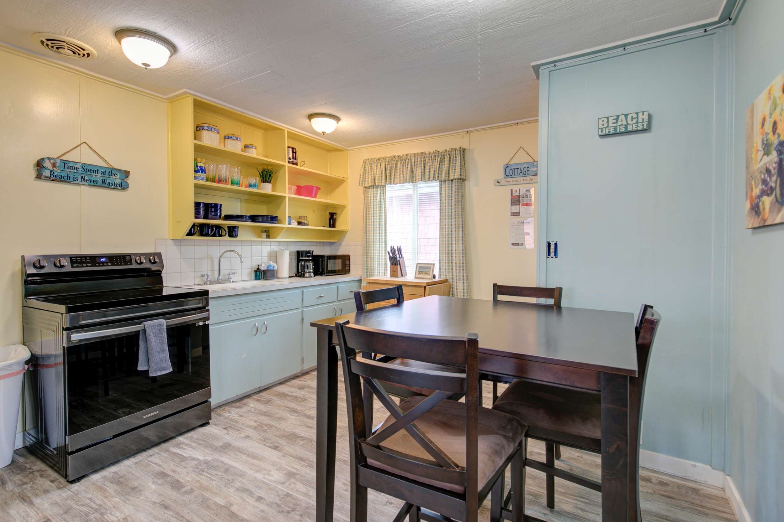 Charming dining for four, paired with a kitchen for easy meals.