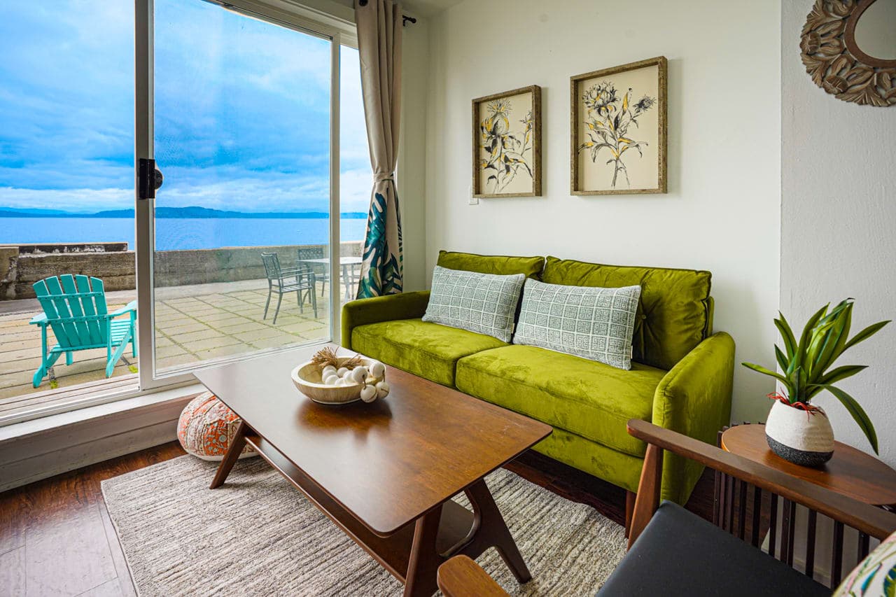 Relish in the breathtaking view of shimmering waters from the comfort of your beautiful living room